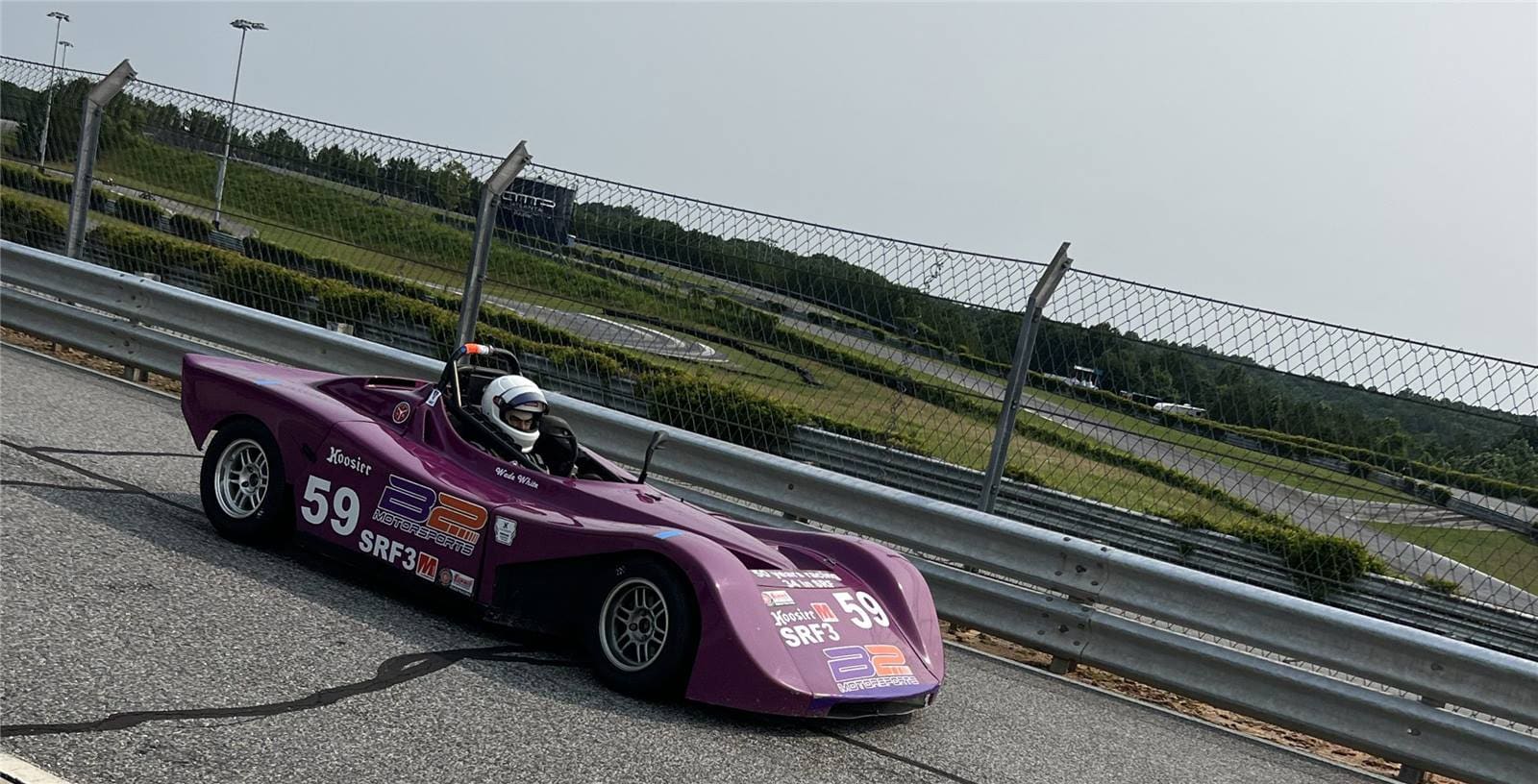 B2 Motorsports Spec Racer Ford car 59 mid-corner on track