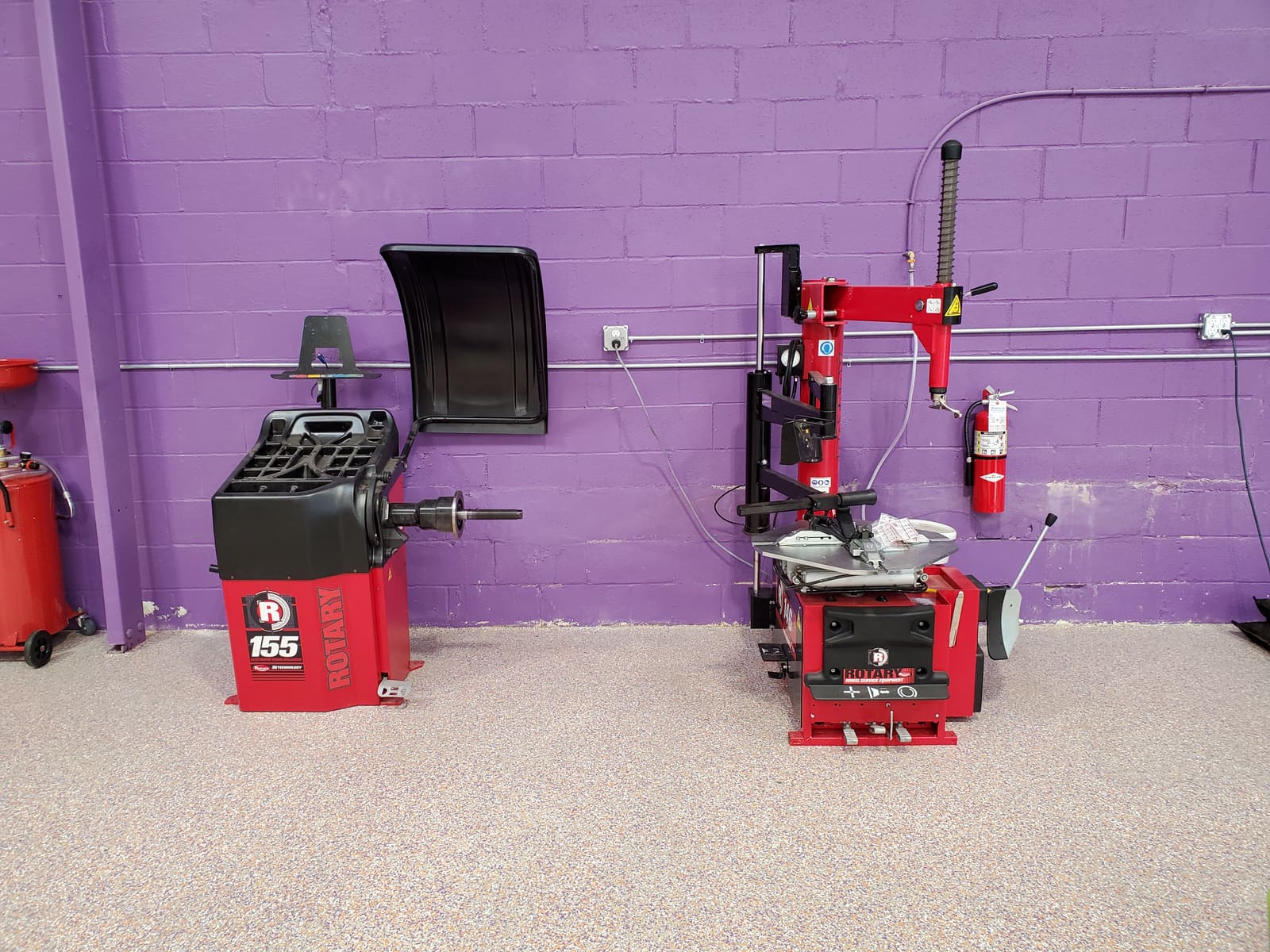 Tire machine and wheel balancer in the B2 Motorsports shop