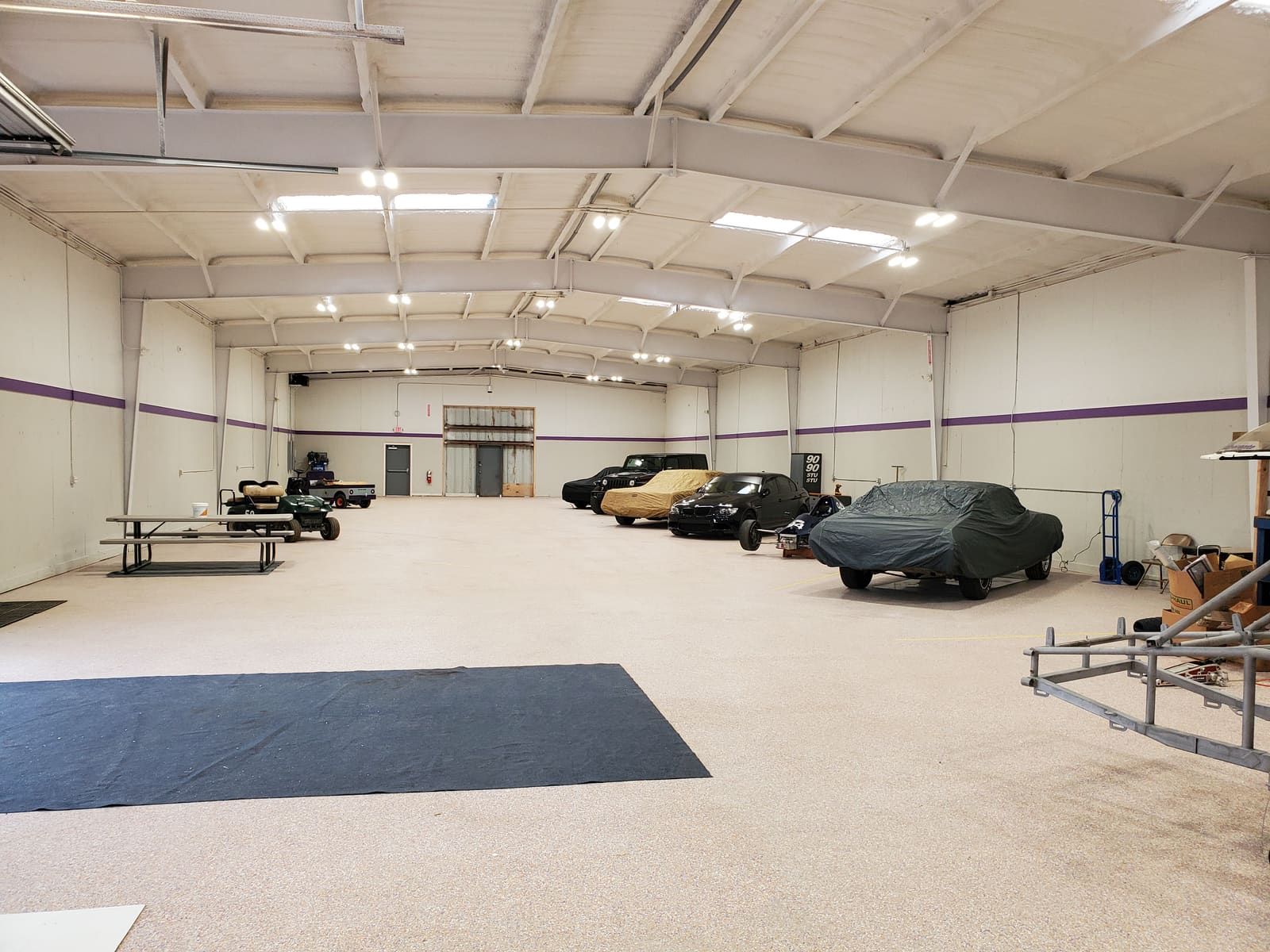 Indoor race car storage hall at B2 Motorsports in Huntsville, AL